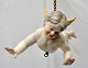 Putto. Fajance. 
19. årh. Med 
gule bemalede 
vinger. Ophæng 
med 
messingkæde. 
L:. 42 cm. H: 
26 ...