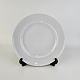 Flad 
frokosttallerken 
i porcelæn fra 
stellet Hvid 
Koppel
Nr. 326
Formgiver 
Henning ...