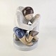 Figur i 
porcelæn med 
motiv af en 
grønlænder med 
et barn 
Nr. 2412
Formgiver Karl 
...