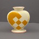 Aluminia yellow christmas heart in faience. With space for a candle and two branches. H. 7.5 cm. ...