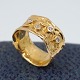 Henning 
Skovgaard; Bred 
ring i 14 kt. 
guld, prydet 
med fire 
diamanter, i 
alt 0.20 ct. 
Ring str. ...