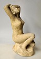 Rasmussen, Ove Fritz (1911 - 1973) Danmark: Kvindefigur. Sandstens figur. Støbt. Signeret. 29 cm. 