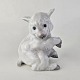 Figur i porcelæn med motiv af et siddende lamProducent Bing og Grøndahl2. ...