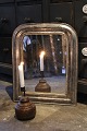 French 19th century Louis Philippe silver mantel mirror.H: 51cm. W: 42cm.
