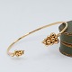 Georg Jensen; 
Moonlight 
Grapes armring 
i 18 kt. guld 
med diamanter.
str. L. dia. 
4,8-6,2 ...