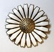 Georg Jensen. Daisy brooch sterling silver with white enamel (925). Diameter 4,2 cm.