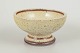 Rörstrand – DrejargruppenBowl, 1977.Thrown stoneware bowl on foot with a warm, speckled ...