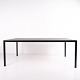 HAY T12 dining table with a black linoleum tabletop and black powder-coated aluminium frame. A ...
