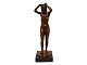 Volmer BahnerBronze figurine of nude lady doing her hair