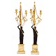 Pair of French firegilt bronze candelabra with marble base. France circa 1810. H: 73cm