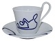 Royal Copenhagen Musica, high handle cup with matching saucer. Decoration C.Designed by ...