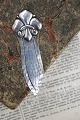 Old bookmark in silver, stamped 830s with the French lily motif...