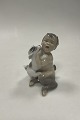 Royal Copenhagen Figurine og Faun with Dog No 2823