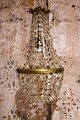 Old, mini prism chandelier in bronze with clear cut glass prisms...