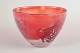 Paul Hoff for Kosta Boda, glass bowl.Bowl in clear and red-toned art glass with encased fish ...