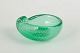 Murano, bowl.Organically shaped small bowl in green art glass with controlled bubbles and a ...