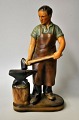Carlsen, Paul Hauch (1922 - 2006) Danmark: En smed. Bemalet gips. Stemplet. H: 30 cm. 