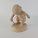 Figur i terrakotta af et barn med en skovl. Nr. 43Design Kai NielsenProducent Ipsens ...