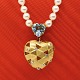 Ole Lynggaard; Jewelry clasp composed of two heart clasps. Woven heart clasp in 14k gold set ...