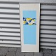 Litografi med blå, hvide og gule farver på lyseblå baggrund i metal ramme. 13/92Signeret Peder ...