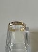 Ladies Ring 14 carat with clear stones.Size: 61.