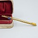 Broche i 14 kt. guld med safir