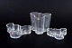 Alvar Aalto for Iittala, sæt af tre skåle og vase.Organisk formet samlet sæt i klart glas ...
