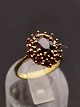 14 karat guld ring med talrige granater