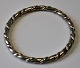 Hans Hansen armring i sterling sølv, design: 206, Kolding, Danmark. Med snoet dekoration. ...