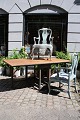 Antique 19th century Swedish folding table with base in blue patinated color and top in raw wood ...