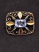 14 karar guld broche 3,5 x 3 cm. med aquamarin 1,3 x 1 cm. emne nr. 640243