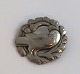 Georg Jensen. Broche med due i sterling sølv (925). Diameter 4 cm.