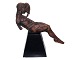 Pia Langelund art pottery, sculpture of nude man wearing a mask. The base is made of ...