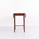 Danish side table crafted in mahogany with two drop leaves. Dating from the 1920s, the table can ...