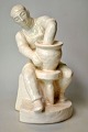 L. Hiort figure of a potter turning, 19th/20th century. ...