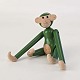 Lille figur i malet bøgetræ med motiv af en chimpanse i vintage grøn farve. Figuren kommer med ...