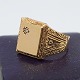 Flemming Kjerultt; Signetring i 14 kt. guld. Prydet med diamant.Ring str. 61.Stemplet "FK ...