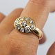Charlotte Sibbeseb Hansen; Ring i 14 kt. guld med 9 diamanter, i alt ca. 0.90 ct. W VS.Ring ...