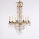 Fransk antik prismelysekrone fra omkring 1890 udført med prismer og dekorative detaljer i ...