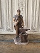 B&G figur - smed No. 2225, 1. sorteringHøjde 29 cm.Design: Axel Locher