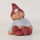 Figur fra serien Klarborg Jul med motiv af drillenissen Nicolai med det uskyldige ansigtsudtryk. ...