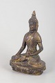 Buddhafigur i forgyldt bronze.