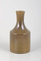 Hyonsun Rhee for Upsala-Ekeby, vase.Slank vase i sennepsgul glaseret stentøj med lang hals ...