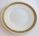 Royal Copenhagen. Vifte med guld. Middagstallerken. ...
