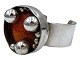 Jacob Hull (1919–1993), Armring i forsølvet metal med stor orange midte fra mellem 1960 og ...