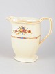 Adams England, kande.Elegant kande i porcelæn med hånddekoreret blomsterbort og forgyldte ...
