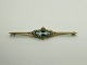 14 karats guld broche