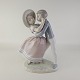 Figur af porcelæn med motiv af et dansende par. Nr 11Producent Lladro, SpainFremstår ...