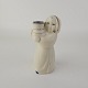 Kongelig figur af blødt porcelæn, med motiv af en pige som bærer en vase. Julelysestage. Nr ...