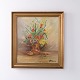 Blomstermaleri med motiv af en buket, signeret og dateret 1920. Maleriet er indrammet i en ...
